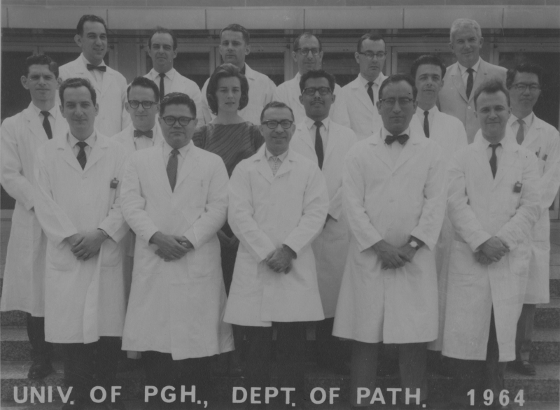 Farber (center, front row, in glasses and polka-dotted tie) came to Pitt in 1961 as chair of pathology. Among his many contributions, his work helped doctors predict how aggressive a cancer might become.